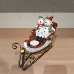 Snowman-couple-on-sleigh.jpg